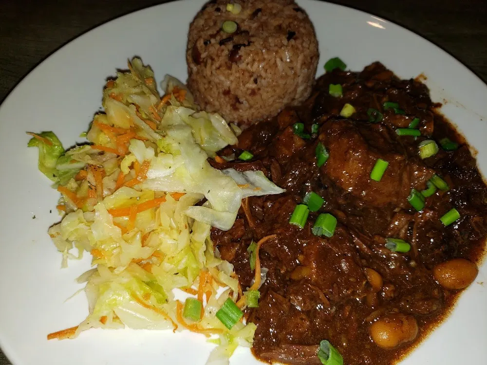 Oxtail Stew Rice and Beans Cabbage